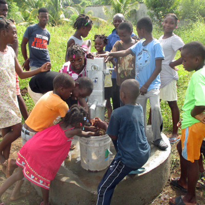 Children at well ready for pump to be installed