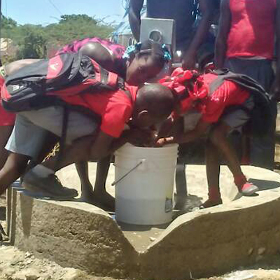 Getting a big drink from the pump!