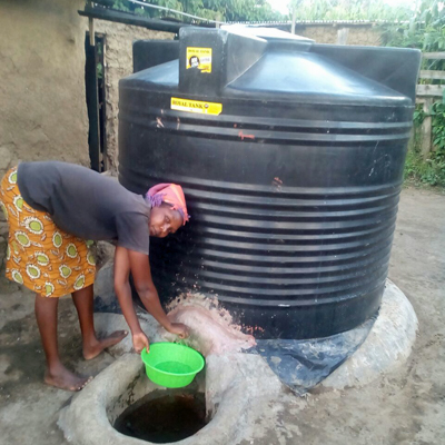 Filling a bucket of safe water