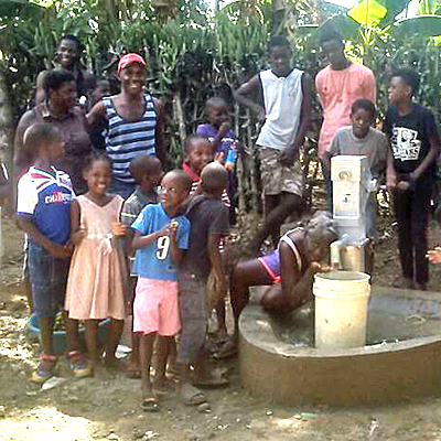 Happy Children around new well
