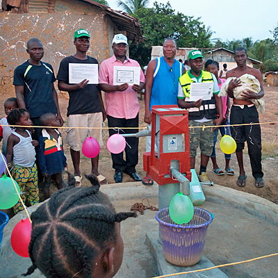 Village Caretakers by new well