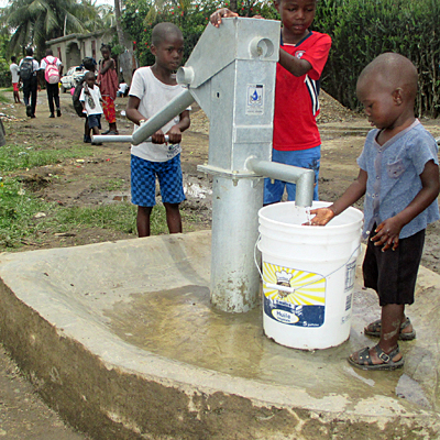 Children Drawing water from Well