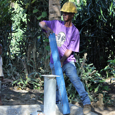Fedan Repairing one of the village Pumps
