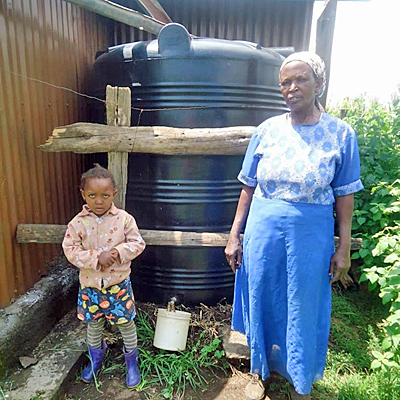 Widow and her grandchild by New Catchment System