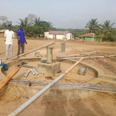 Village hand pump undergoing repair 