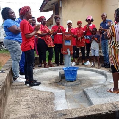 Grateful villagers during the launch of a rehabilitated well