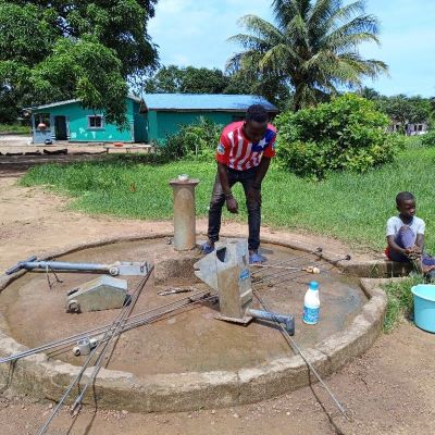 Village hand pump undergoing repairs 