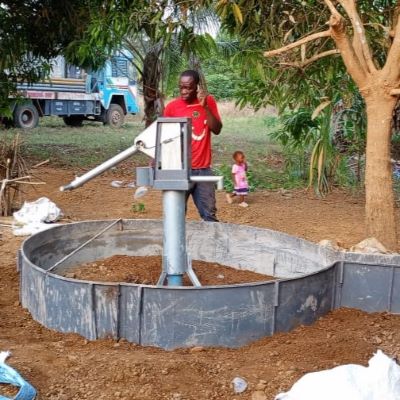 Hand pump installation underway