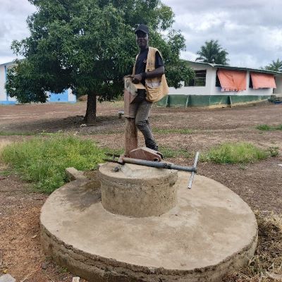 Village hand pump undergoing repairs 