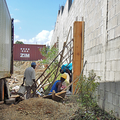 Continuing the row of buttresses along Wall