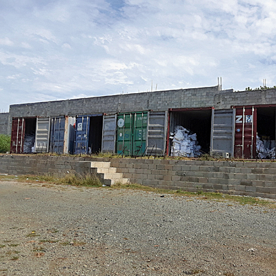 New Container of pumps on far rt side of string of containers