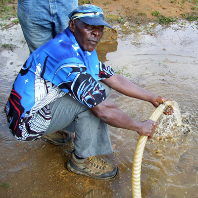Lead driller Yogi developing a well with one of the Grundfos Pumps