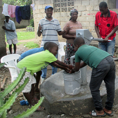 Children enjoying fresh, cold water!