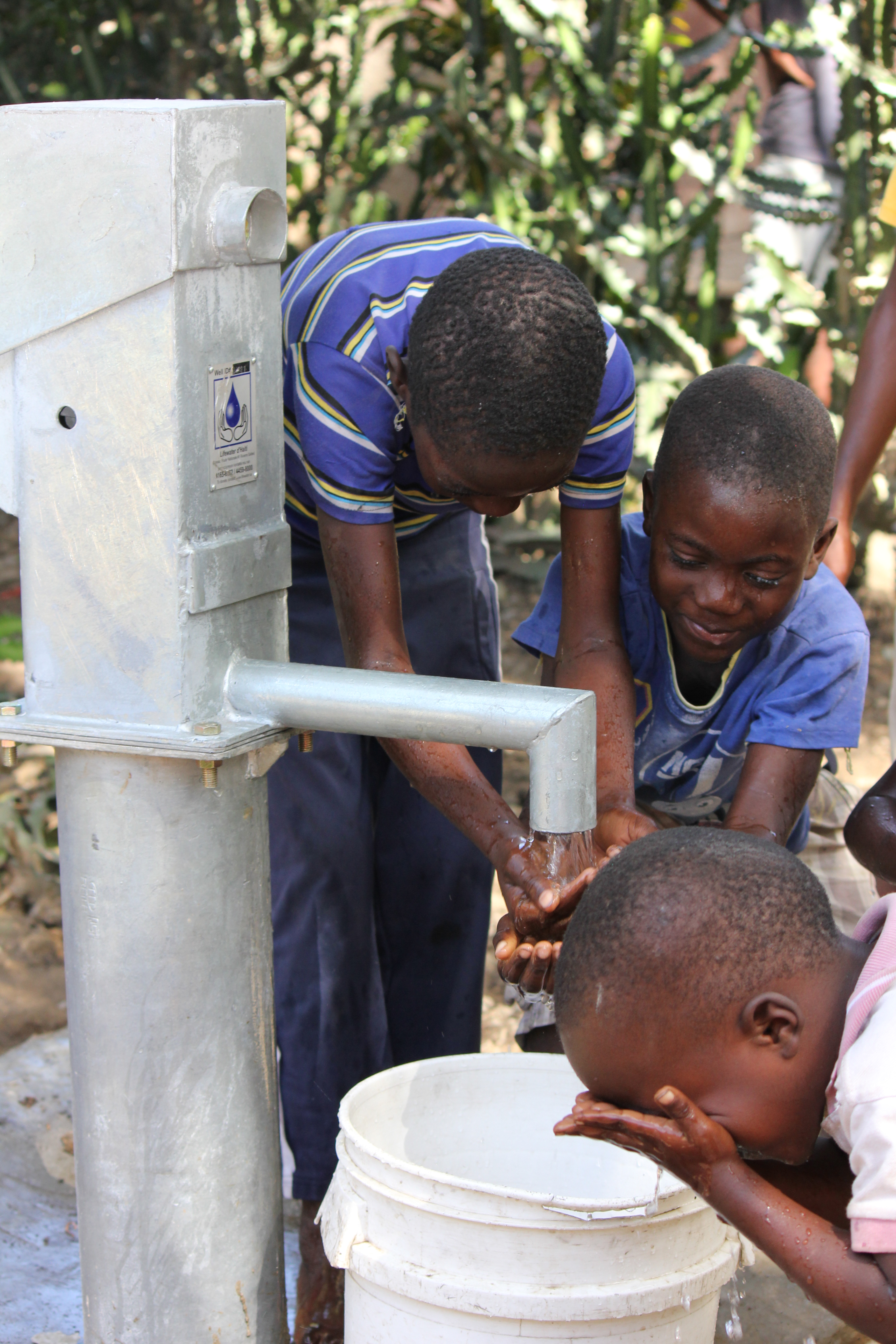 Community Children Enjoying their New Well!