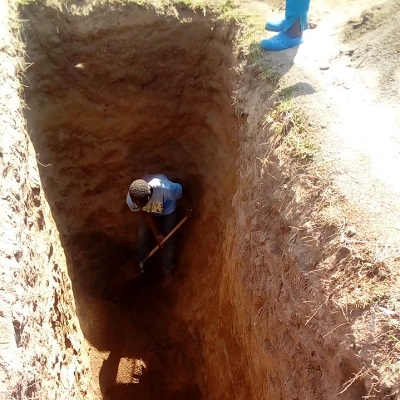 Digging the deep pit for the latrine