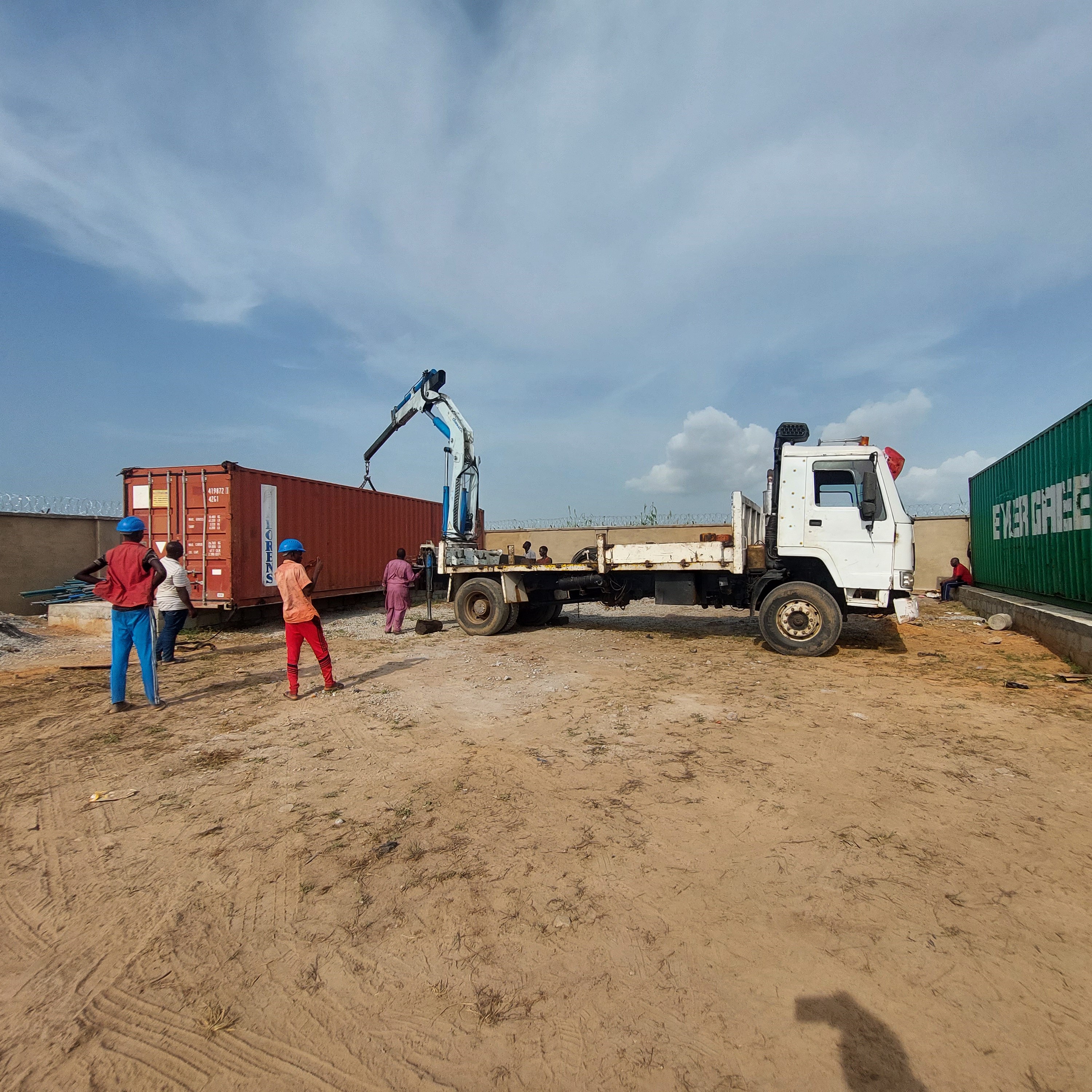 Moving new 40 foot container on Cement pad