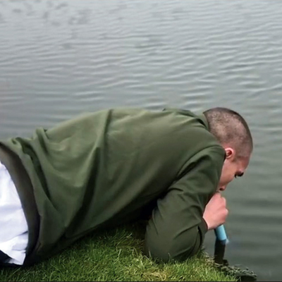 drinking from the Lifestraw