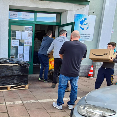 Everyone helping to load supplies into the new rental storage facility