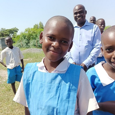 A happy student at Ogenya Primary School 