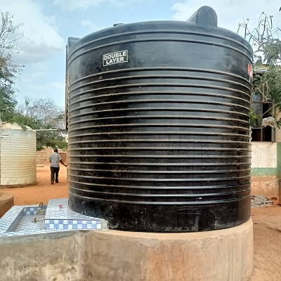 Rainwater tank and handwashing station at Kyumbe Primary School 