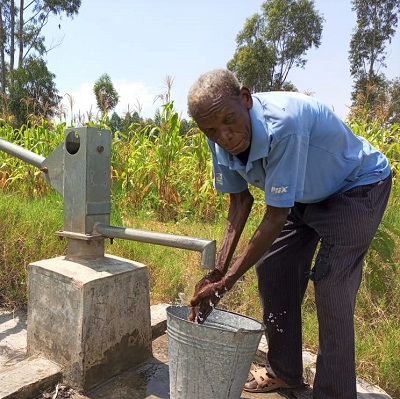 A resident from Kabungu community is grateful to have access to clean and safe water