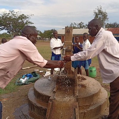 Karombe Primary School hand pump working again after successful repair 