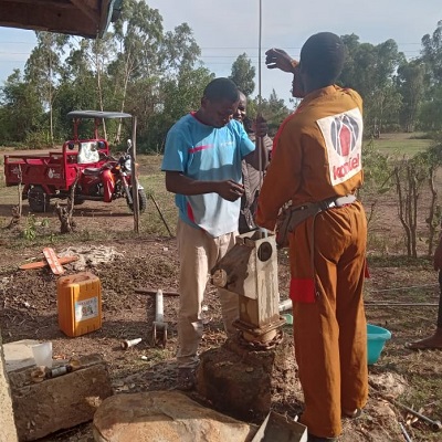 Pump repair team working to restore water to the community
