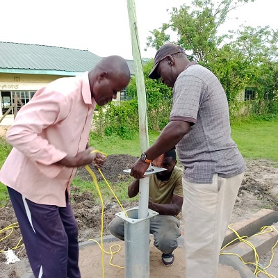 The team is working on the installation of a pump on the new well