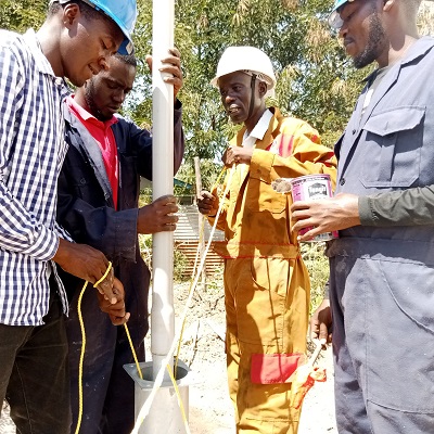 The borehole drilling team at work 