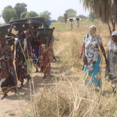 Community women returning from the stream 