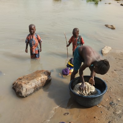 Children at the community river 
