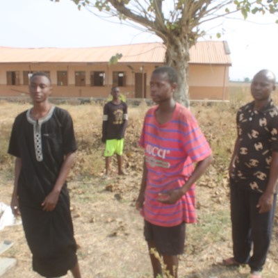 Community youths waiting expectantly