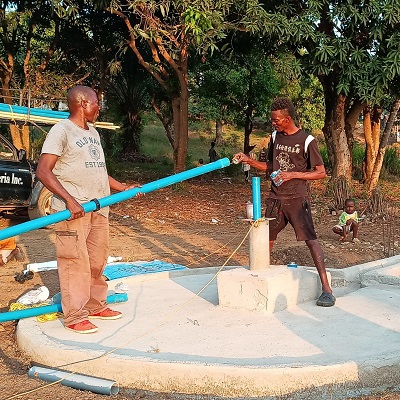 The team working to rehabilitate the pump 
