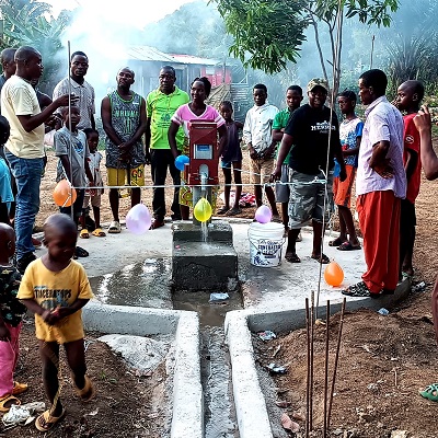The communal hand-pump is as good as new 