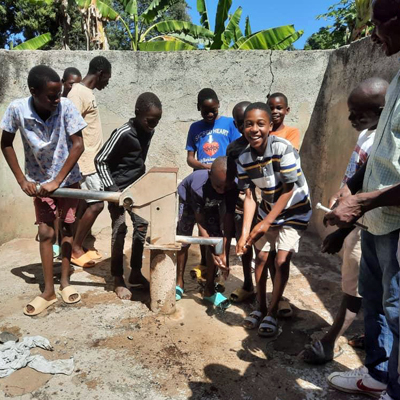 Happy Children at well