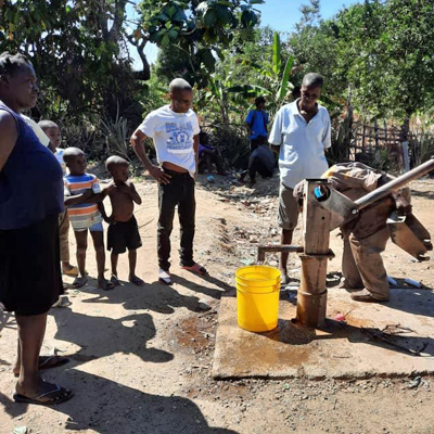 Celebrating the repaired pump