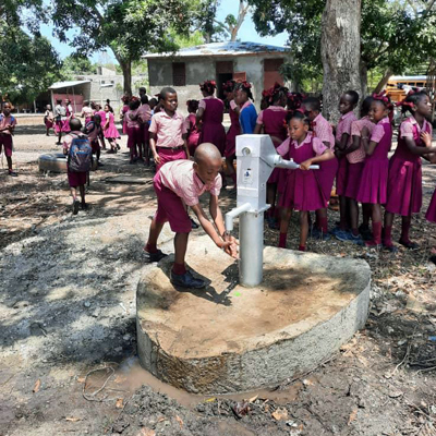 School children at well