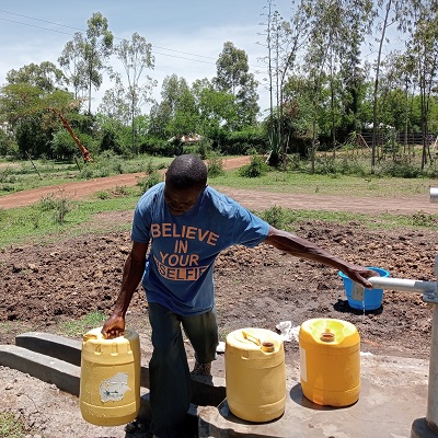 Community member grateful to take clean water home 