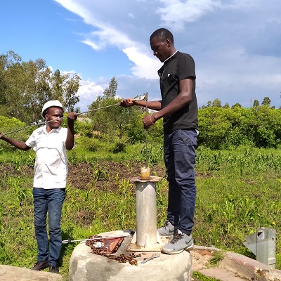 The broken hand-pump undergoing rehabilitation