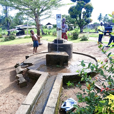 Dark Forest Dabra communal hand-pump after repair 