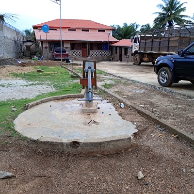 The hand-pump supplies water to over 200 people