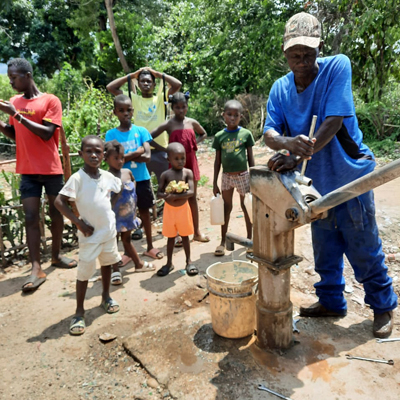 Team fixing broken pump