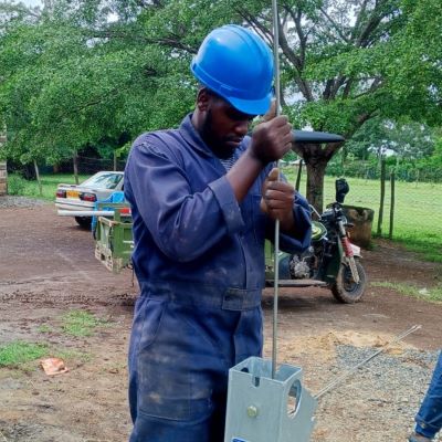 Hand pump repair in progress 