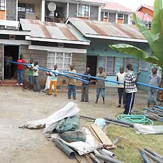 Orphan Boys Helping