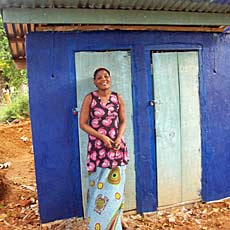 Caretaker in front of Washroom